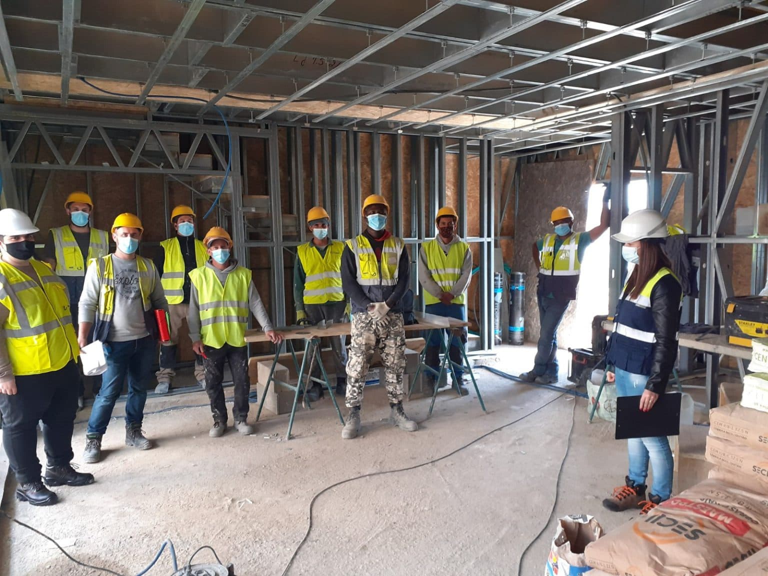 Equipa de construção Êxodo Construções